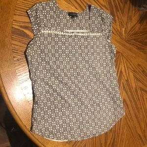 A beautiful black design on white, blouse